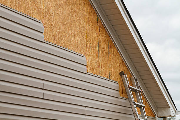 Professional Siding Installation technician working in LaFayette, GA